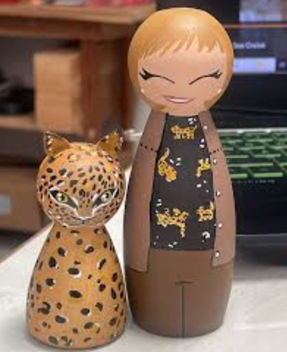 Hand painted wooden dolls